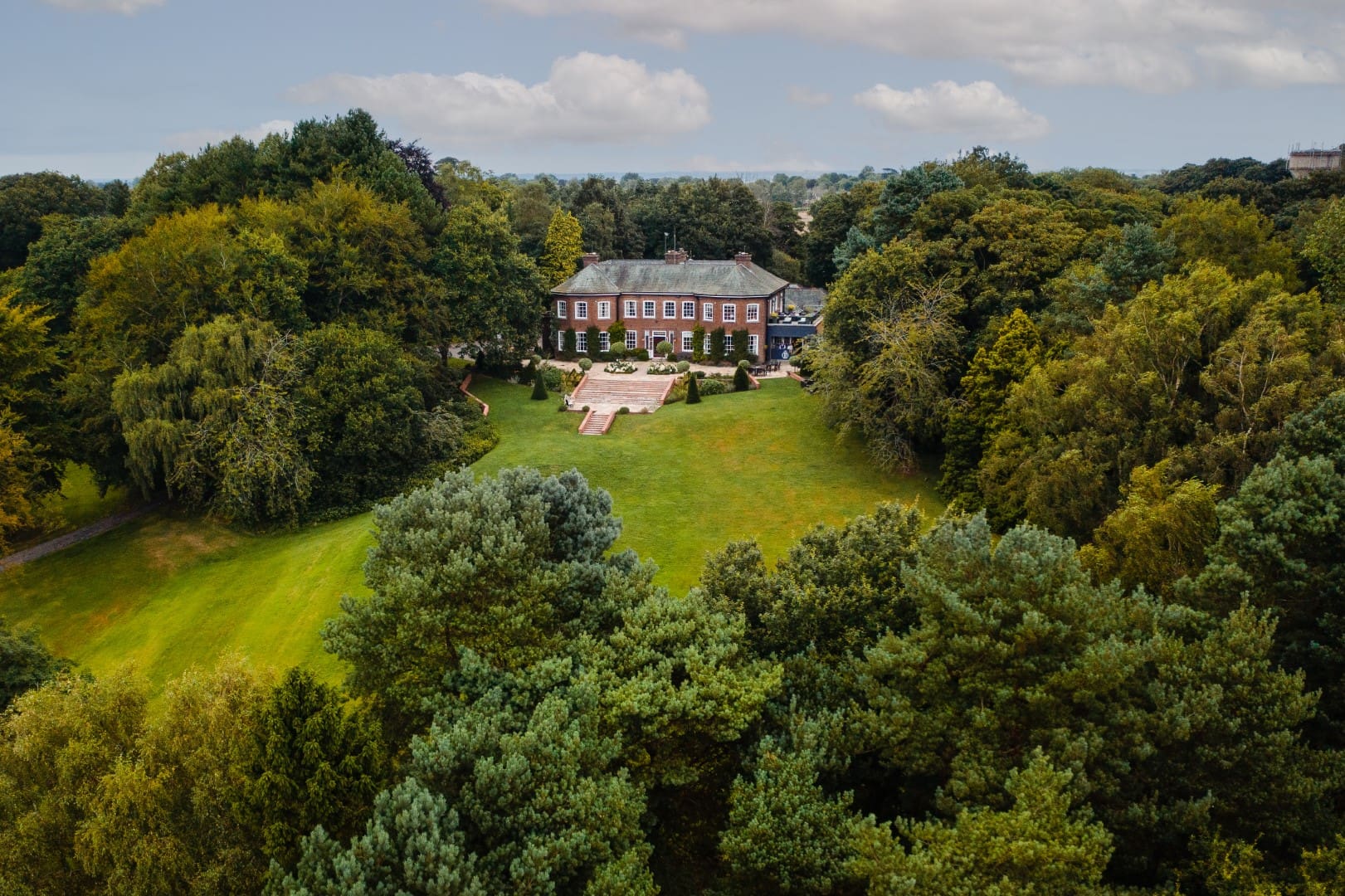 Delamere Manor logo